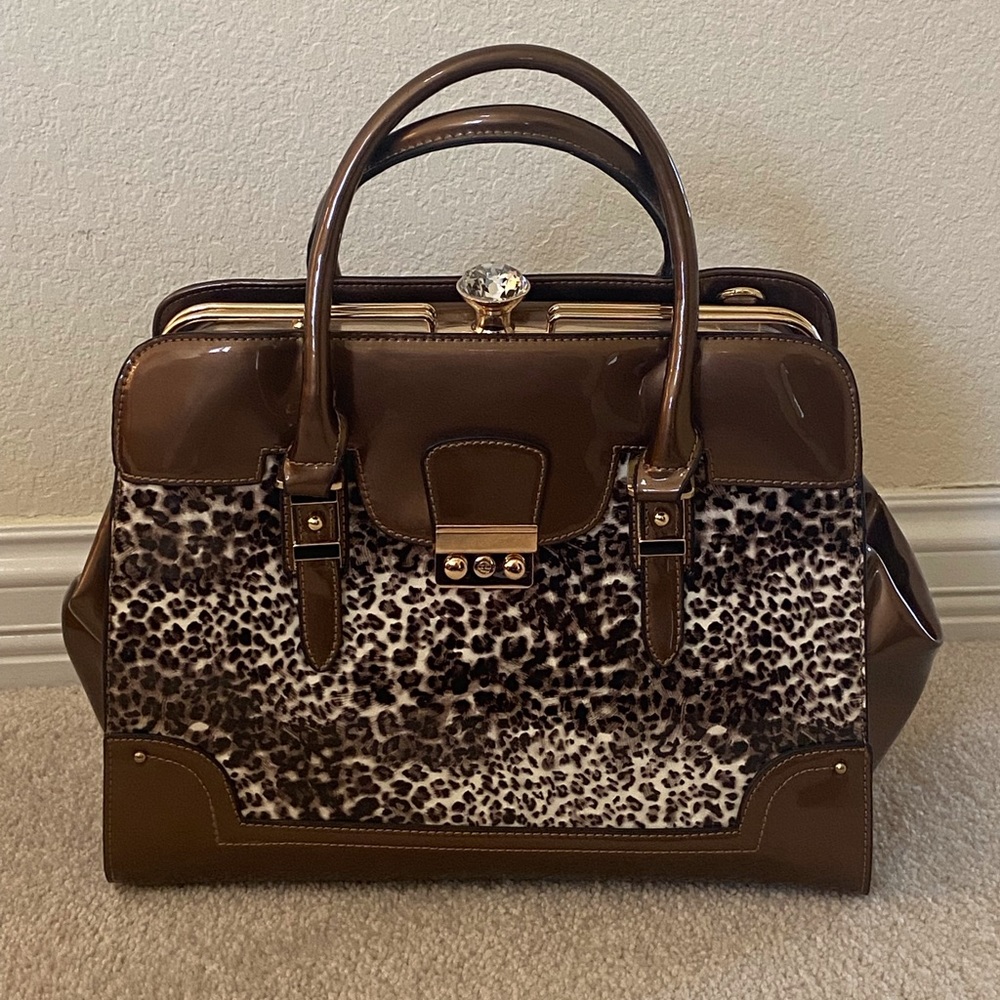 Fun large Gold Bag. 10 1/2” high, 13” wide, 5 1/2” deep.